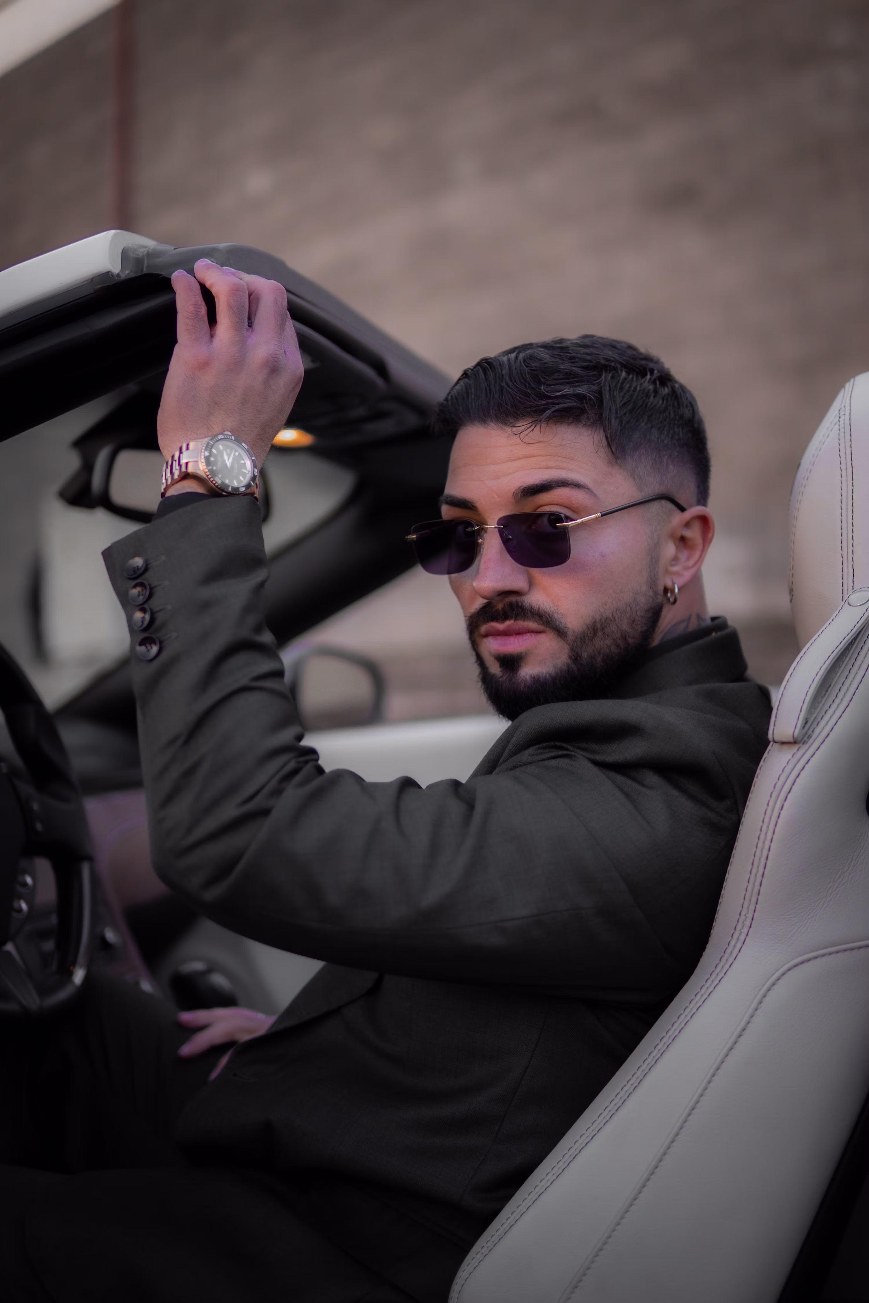 Man wearing premium black sunglasses